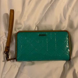 teal fossil wristlet